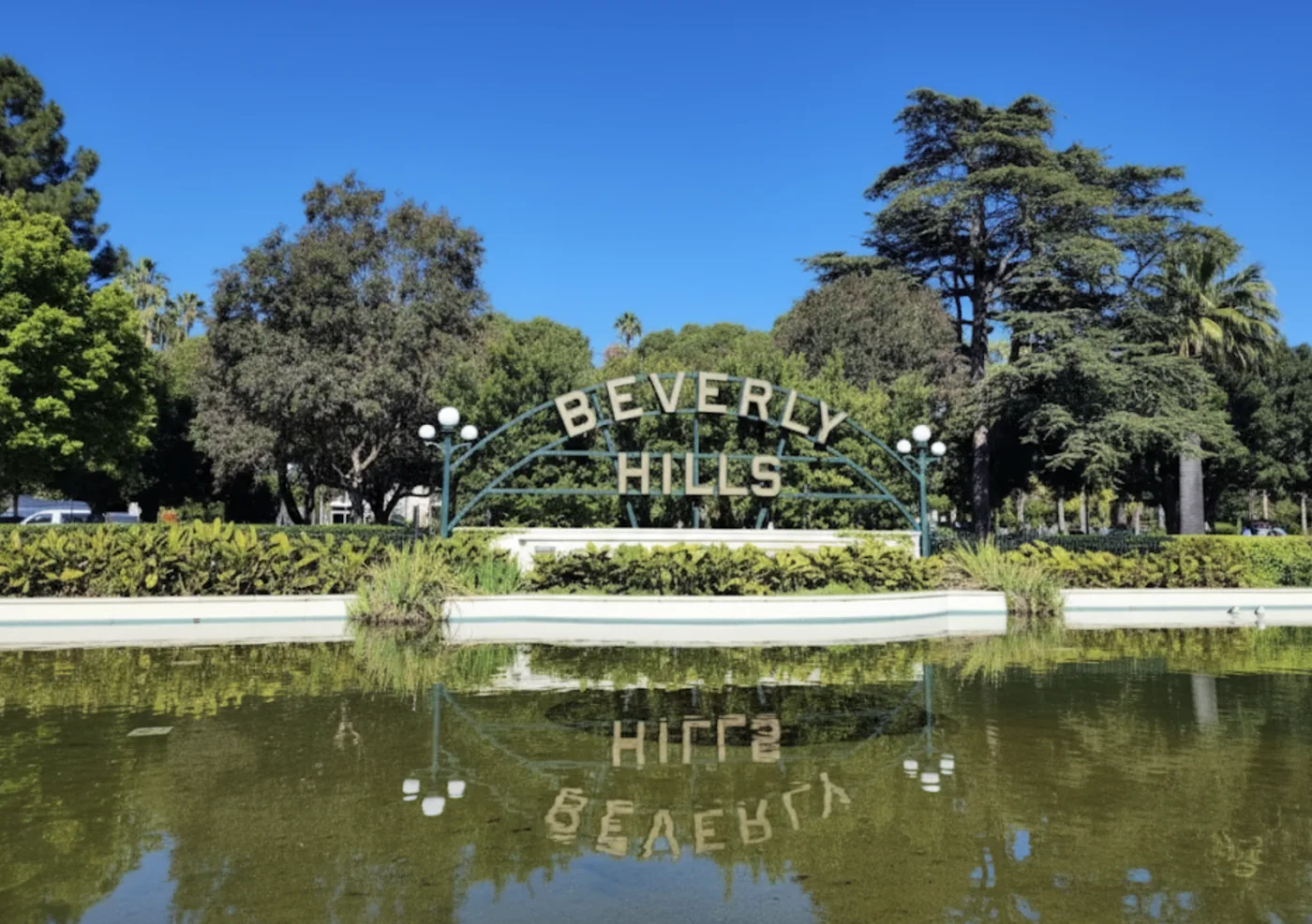 a photo of the Beverly Hills sign near Rodeo Drive